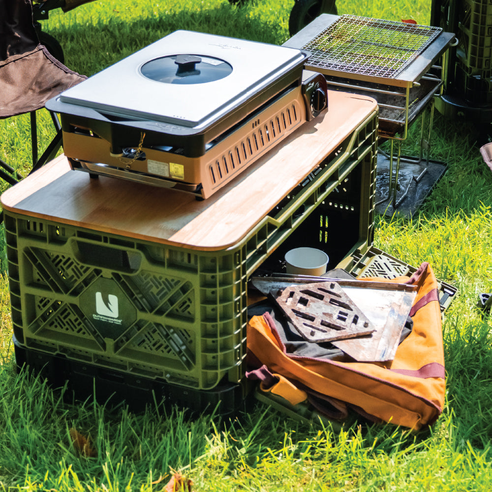 T-90 wooden lid used as a tabletop in an outdoor setting