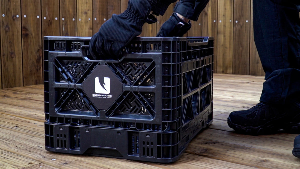 Two T-90 collapsible storage crates open and loaded with gear